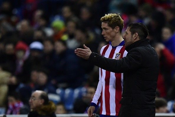 Torres làm loạn hàng thủ Rayo ở trận thắng 3-1 của Atletico 9