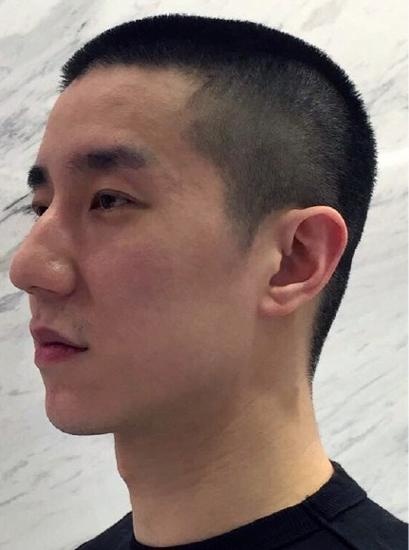 Thành Long cắt tóc cho con trai sau khi ra tù 6