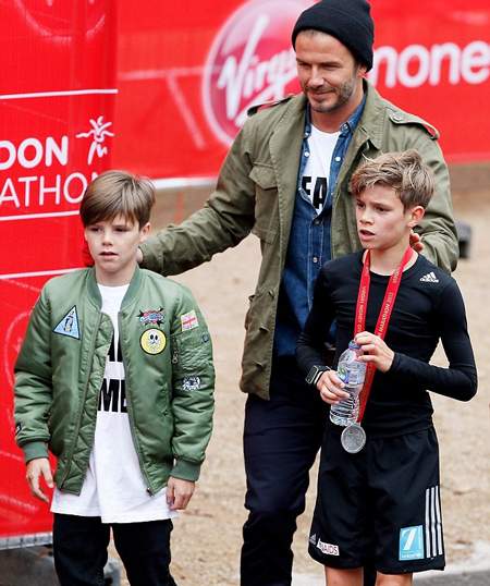 Victoria Beckham diện giày cao 14 cm đi cổ vũ con trai chạy việt dã 11