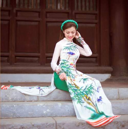 Hồ Đức Vĩnh và hoa hậu Thái Nhiên Phương mặc áo dài đón Tết cổ truyền 21