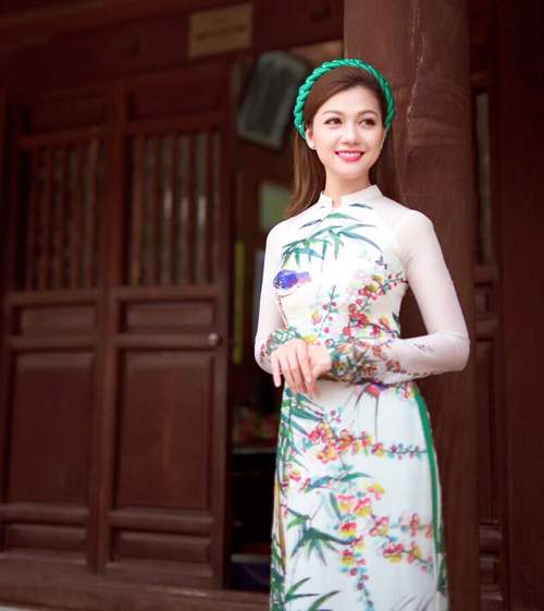 Hồ Đức Vĩnh và hoa hậu Thái Nhiên Phương mặc áo dài đón Tết cổ truyền 15