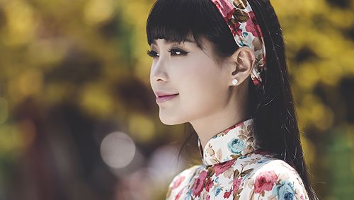 Á hậu Diễm Trang diện áo dài hoa đón Tết 5