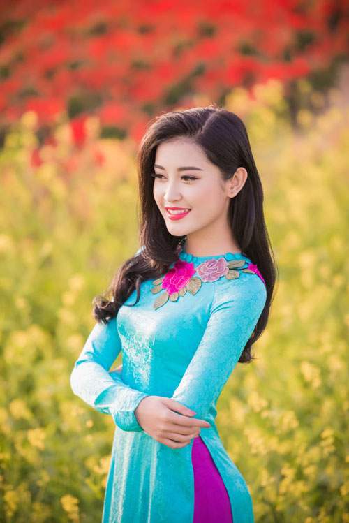 6 kiểu tóc kết hợp áo dài đẹp nhất của sao Việt 18