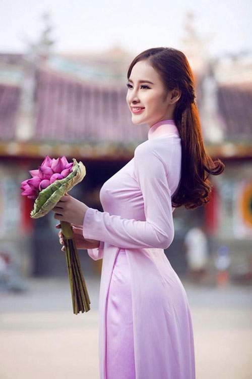 6 kiểu tóc kết hợp áo dài đẹp nhất của sao Việt 27