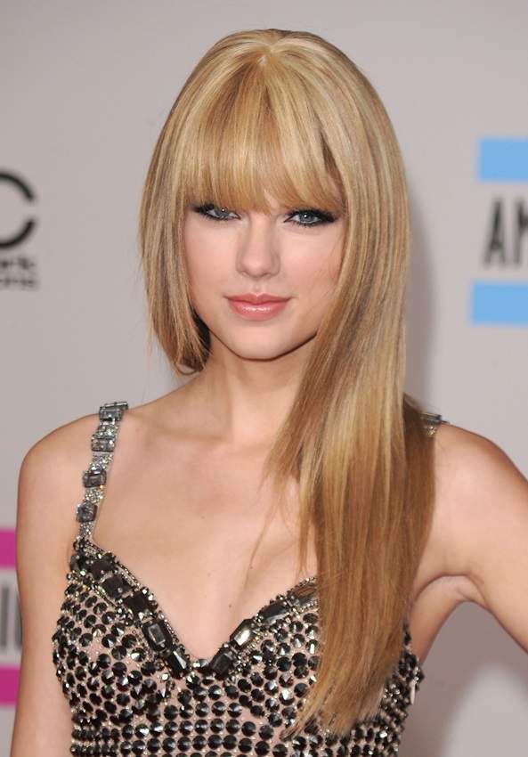 Những kiểu tóc ai cũng thèm muốn của Taylor Swift 18