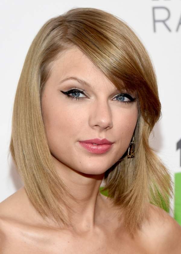 Những kiểu tóc ai cũng thèm muốn của Taylor Swift 30