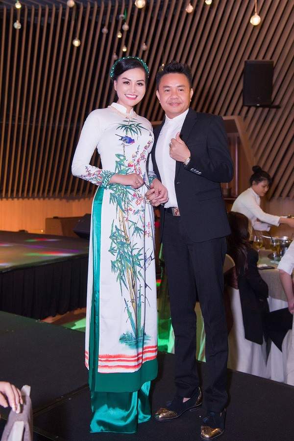 Nữ Hoàng Trần Huyền Nhung diện áo dài của NTK Ngọc Hân đi event hoa hậu quý bà. 7