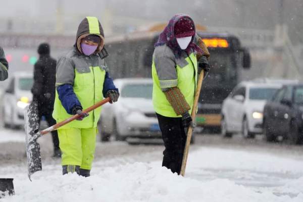 Bão tuyết bất thường càn quét Trung Quốc: Người dân co ro vật lộn với thời tiết kinh hoàng! 10