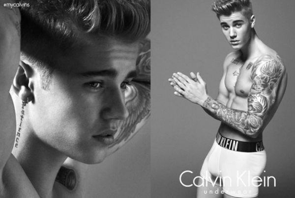 Justin Bieber ngực trần khoe hình xăm bên siêu mẫu